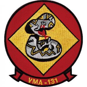 Military patch with a coiled snake and VMA-131 text.